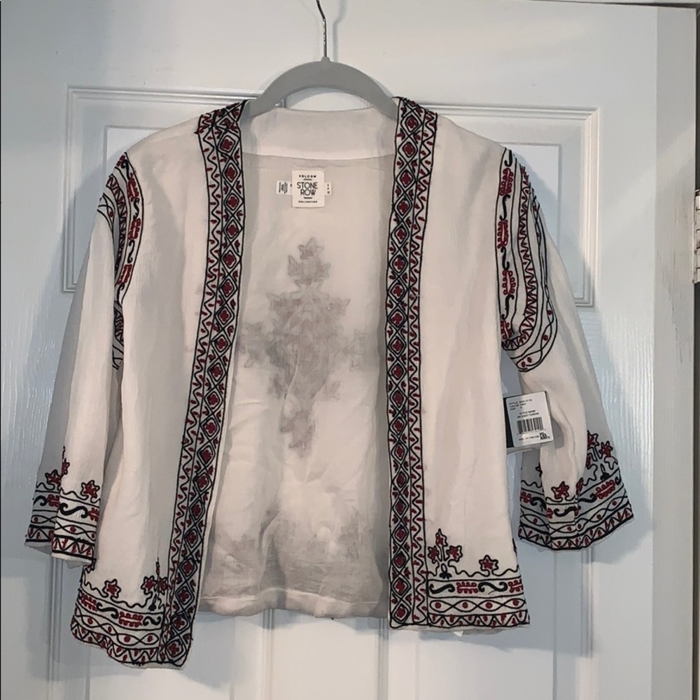 White cardigan. STILL HAS TAGS